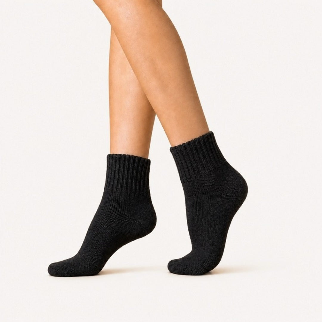 CURVD Cozy Fall Slouch Socks in Black, worn to show the fit